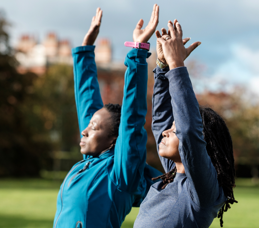 Two women exercising in the park